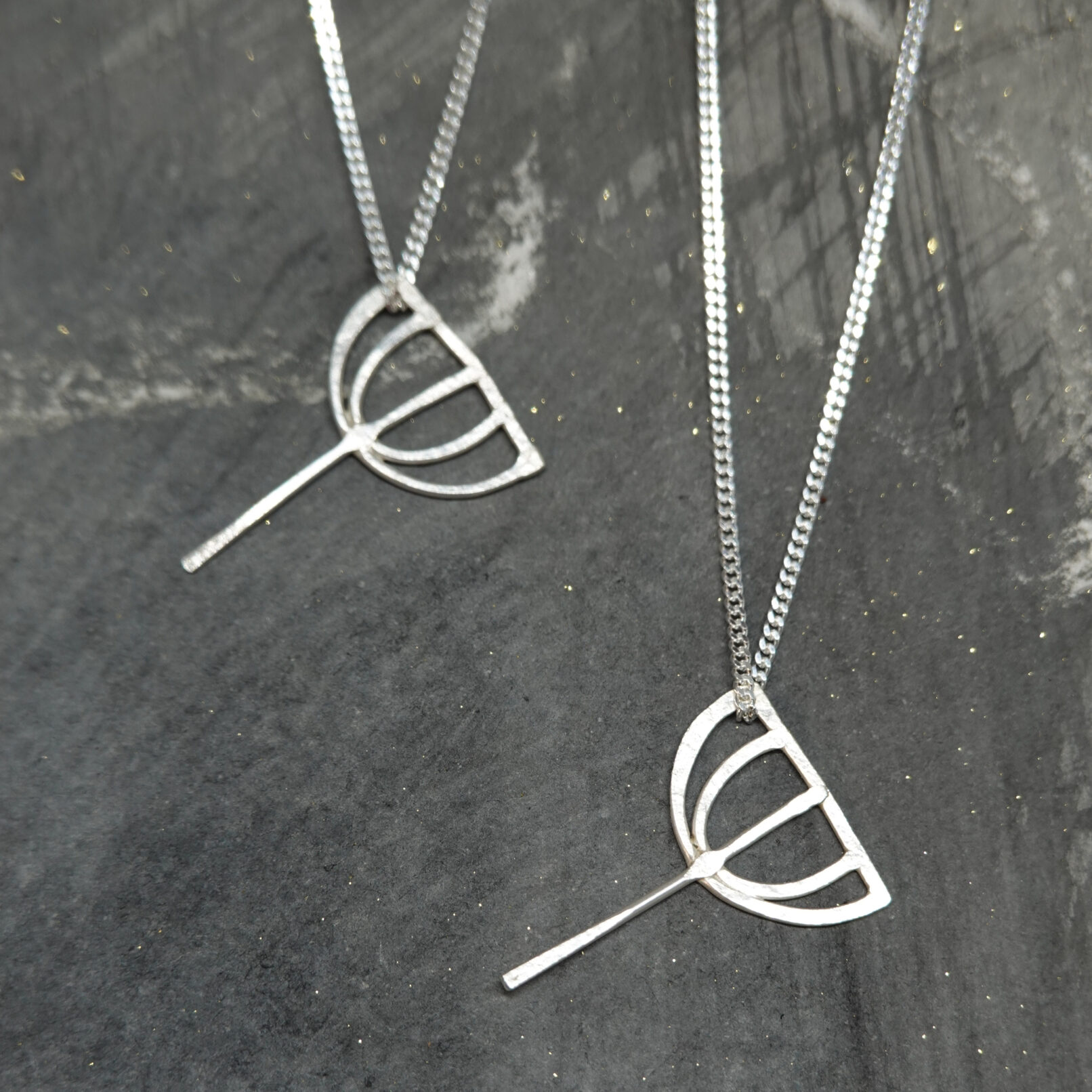 Seed head pendants on delicate silver chain