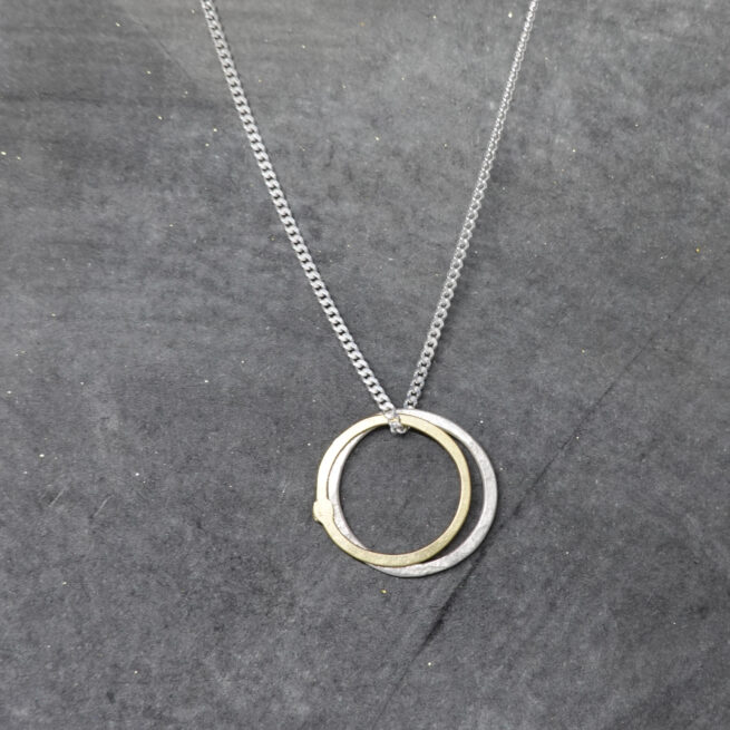 Circle necklace in silver and gold